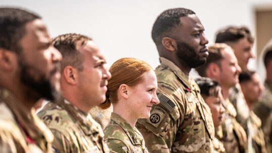 Service members standing in line
